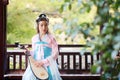 Elegant woman in Chinese traditional drama ancient costume play Chinese lute pipa guitar Royalty Free Stock Photo