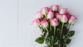 Graceful bouquet of pink roses against a pristine white backdrop Royalty Free Stock Photo