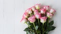 Graceful bouquet of pink roses against a pristine white backdrop Royalty Free Stock Photo