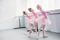 graceful elegant little ballerinas practicing together