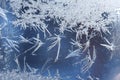Graceful expressive winter natural background, macro texture. Copy space. Frosty pattern on winter window glass Royalty Free Stock Photo