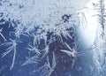 Graceful expressive winter natural background, macro texture. Copy space. Frosty pattern on winter window glass Royalty Free Stock Photo