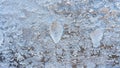 Graceful expressive winter natural background, macro texture. Copy space. Frosty pattern on winter window glass Royalty Free Stock Photo