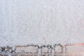 Graceful expressive winter natural background, macro texture. Copy space. Frosty pattern on winter window glass Royalty Free Stock Photo