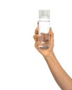 A graceful female hand lifts a blank cosmetic container with clear plastic cap against white backdrop