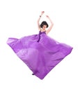 Graceful girl in flying purple silk fabric