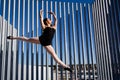 Graceful jumping of a classic dancer in Malaga. Royalty Free Stock Photo