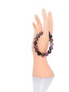 A graceful mannequin\'s hand is displayed, adorned with an elegant bracelet, emphasizing its beauty and uniqueness