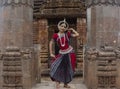 Graceful pose of a Classical odissi or orissi dancer at Mukteshvara Temple,Bhubaneswar, Odisha, India Royalty Free Stock Photo