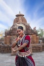 Graceful Pose of Odissi dancer posing in front of Mukteshvara temple.
