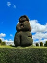 Graceful Tribute: Woman Topiary Adorns Ecuadorian Sanctuary