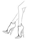 Graceful women`s feet in elegant shoes