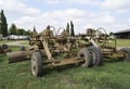 Grader on a trailer for heavy equipment. Royalty Free Stock Photo