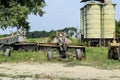 Grader on a trailer for heavy equipment. Royalty Free Stock Photo