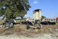 Grader on a trailer for heavy equipment. Trailer Hitch for tractors and combines. Trailers for agricultural machinery Royalty Free Stock Photo