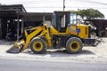 Grader and yellow bulldozer excavator Construction Equipment with clipping on street. Royalty Free Stock Photo