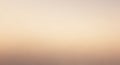 Gradient background with a soft transition from beige to light peach, creating a smooth Royalty Free Stock Photo