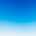 A gradient of blue shades transitioning from a deeper blue at the top to a lighter blue at the Royalty Free Stock Photo