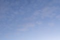 Gradient blue sky with plenty of small soft clouds. Tranquillity scene. Background image