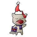 gradient cartoon of a cat with christmas present wearing santa hat