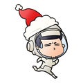 gradient cartoon of a stressed astronaut wearing santa hat