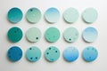 Gradient circles in shades of blue and green, arranged in a minimalist design