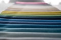 Gradient colored luxury velvet samples folded in rows