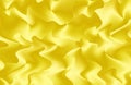 Gradient illuminating yellow 3D wavy pattern for background