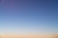 Gradient sky in sunset time with orange to baby blue color / gradient effect / background concept / sky texture Royalty Free Stock Photo