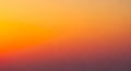 A gradient of warm colors transitioning smoothly from deep red at the bottom to a Royalty Free Stock Photo