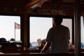 At the Helm Toward Barbana Island