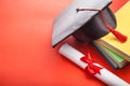 Graduate hat and book Royalty Free Stock Photo