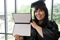 Graduate with Her Diploma Royalty Free Stock Photo