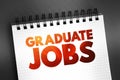 Graduate Jobs text on notepad, concept background