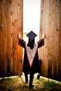 Graduate Opening Doors to a Bright Future Royalty Free Stock Photo