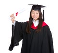 Graduate student hold diploma