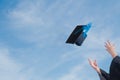 Graduate success celebration throw graduation cap in the sky con