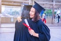 She is Graduate and wearing  graduate`s dress. Royalty Free Stock Photo