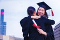 She is Graduate and wearing  graduate`s dress. Royalty Free Stock Photo