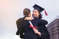 She is Graduate and wearing graduate`s dress. Royalty Free Stock Photo