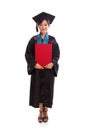 Full length profile of female graduate in her academic dress holding a red placard, stand on white background Royalty Free Stock Photo