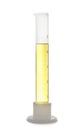 Graduated cylinder with yellow liquid isolated Royalty Free Stock Photo