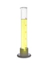 Graduated cylinder with yellow liquid isolated on white Royalty Free Stock Photo