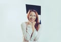 Graduated student, woman daydreaming smiling Royalty Free Stock Photo