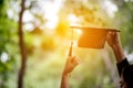 Graduates are expressing joy at graduation. He is a successful person - image