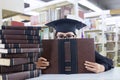 Graduating student girl in an academic gown