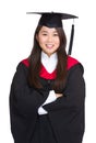 Graduating student girl in an academic gown Royalty Free Stock Photo
