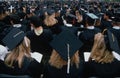 Graduating students in cap and gowns