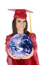 Caucasian teenager wearing a graduation gown holding the earth Royalty Free Stock Photo