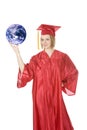 Caucasian teenager wearing a graduation gown holding the earth Royalty Free Stock Photo